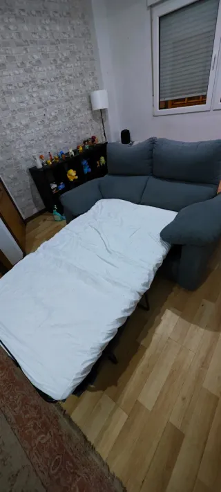 Sofá cama gris azulado