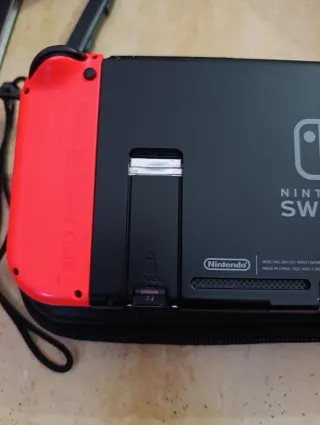 Nintendo Switch + 9 juegos + funda y accesorios