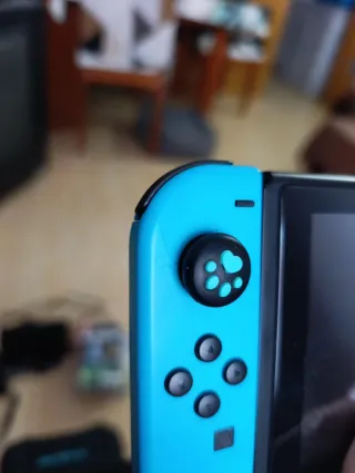 Nintendo Switch + 9 juegos + funda y accesorios