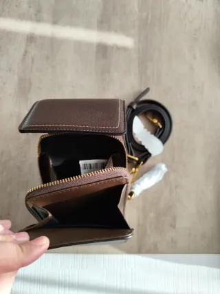 Bolso móvil convertible a bandolera