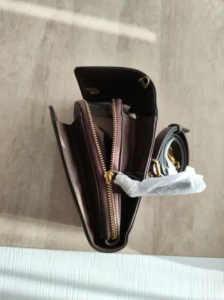 Bolso móvil convertible a bandolera