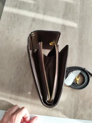 Bolso móvil convertible a bandolera