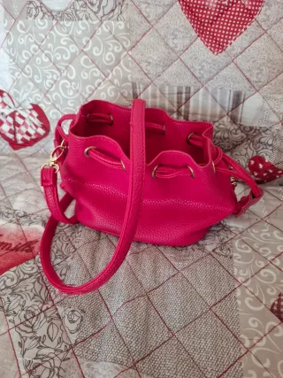 Borsa The Bridge a secchiello fucsia