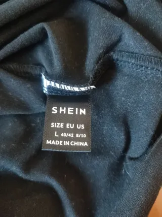 Blusa negra con lentejuelas