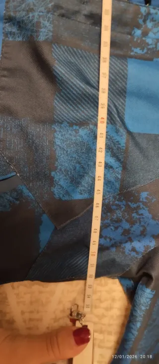 Anorak McKinley niño azul y negro Talla 14 años