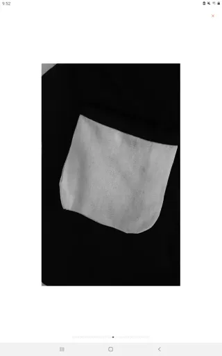 Chaleco bordado de loros y flores