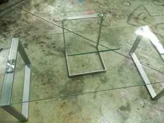 Mesa de centro cristal y metal plateado Super buen