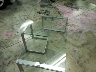 Mesa de centro cristal y metal plateado Super buen