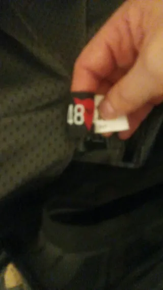 Mono Dainese 2 piezas Negro/Rojo