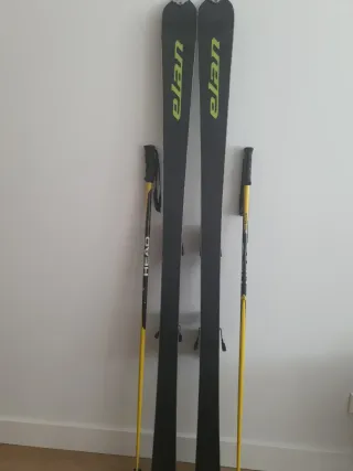 Esquís Elan Fusion con bastones Head