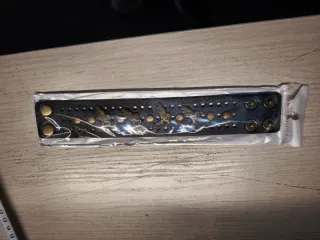 Bracciale nero con aquile dorate