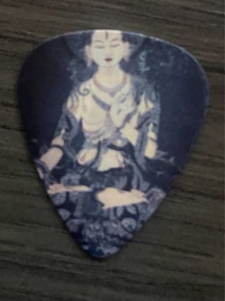 Púas de guitarra con diseño budista