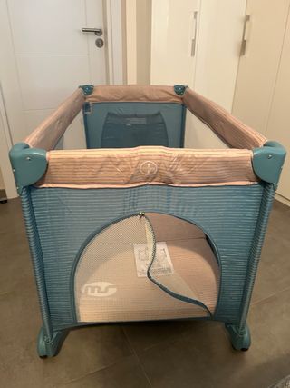 Cuna de viaje gana complet