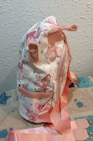 Mochila antirrobo mariposas rosa y blanco