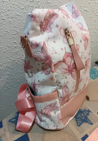 Mochila antirrobo mariposas rosa y blanco