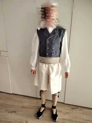 Chaleco fallero azul con estampado beige