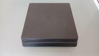 PS4 (PlayStation 4) con 1 mando y 3 juegos