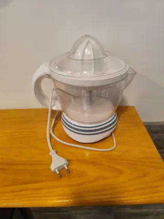 Exprimidor eléctrico de naranjas