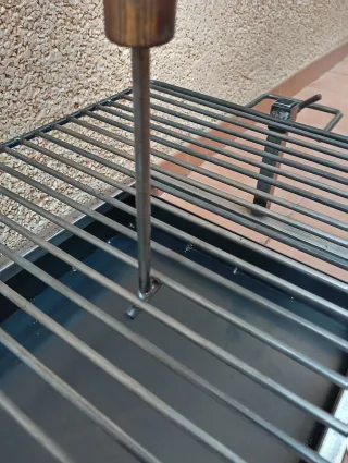 Griglia regolabile per barbecue