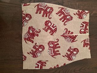 Gonna vintage beige con elefanti rossi taglia S