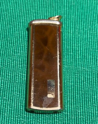 Mechero antiguo dorado