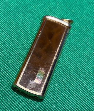 Mechero antiguo dorado