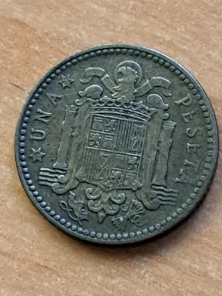 1 Peseta
