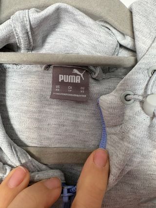Chaqueta deportiva Puma gris y blanca T.XS