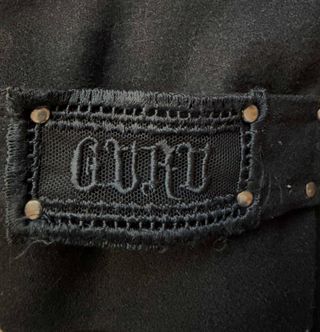 Abrigo GURU Negro Talla S