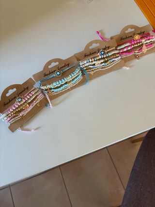 Pack 4 pulseras mal de ojo mano de Fátima