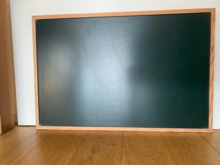 Pizarra verde con marco de madera