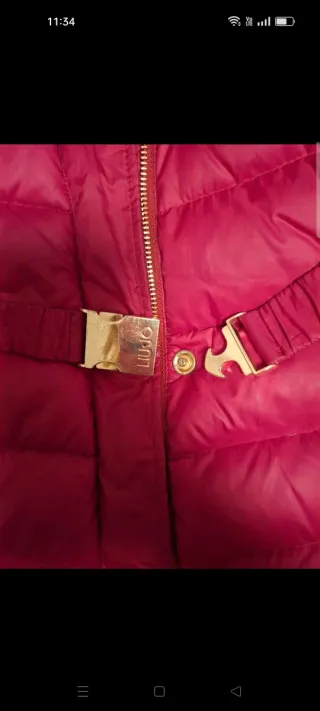 Piumino bambina rosso con cappuccio