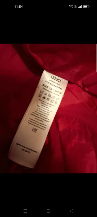 Piumino bambina rosso con cappuccio