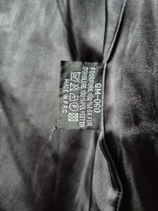 Abrigo de pelo negro