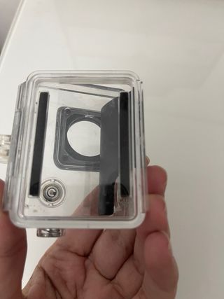 GoPro Hero 4 con carcasa y accesorios