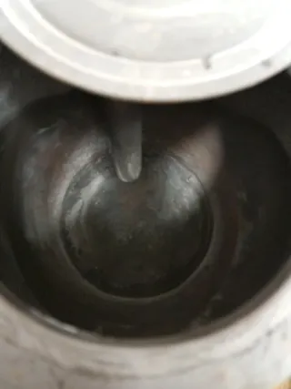 Estufa de leña con protector y salida de humos