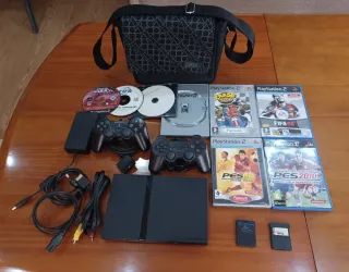 Consola PS2 com 2 comandos e 8 jogos