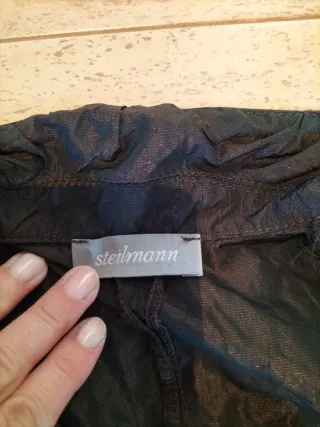 Conjunto falda y chaqueta negra brillante