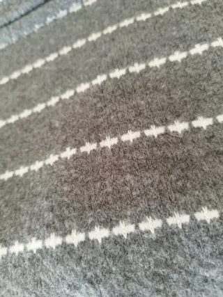 Jersey cuello vuelto rayas grises y blancas