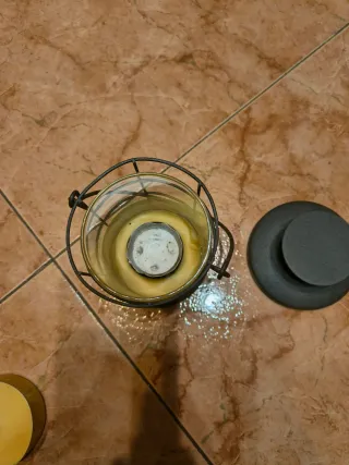 Farol rustico de vela de cristal y metal