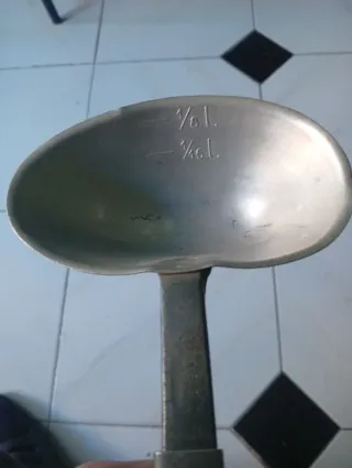 Cucharón antiguo báscula