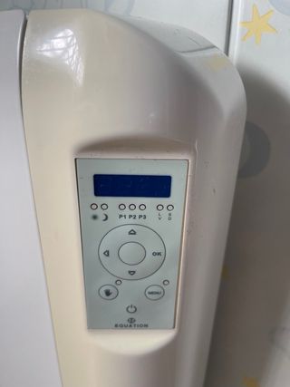 Calefactor eléctrico blanco y beige