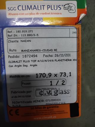 Puerta metálica doble cristal Climalit Plus