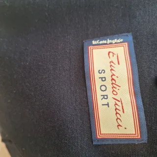 Americana de punto azul marino