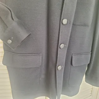 Americana de punto azul marino