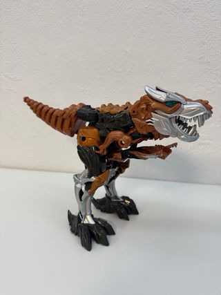 Robot Transformer Naranja y Plateado