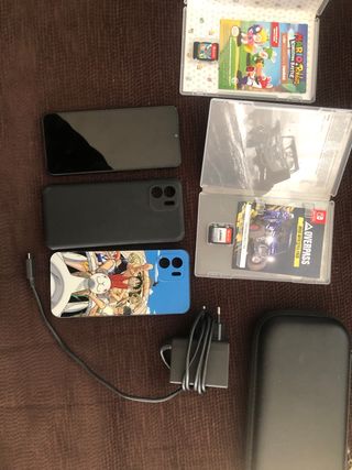 Móvil redmi A2 dos juegos Switch y 2 fundas