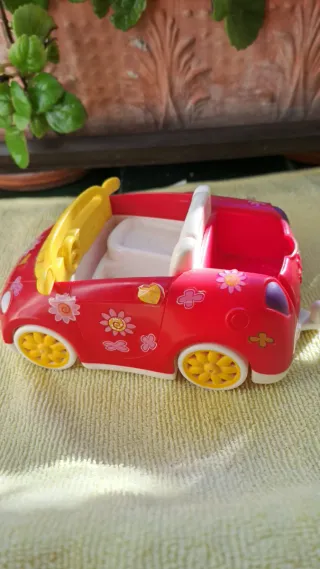 Cochecito Pin y Pon rosa con flores