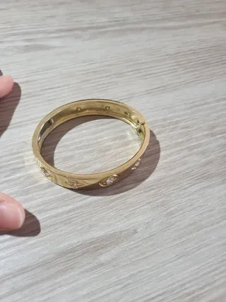 Pulsera rígida dorada cristales