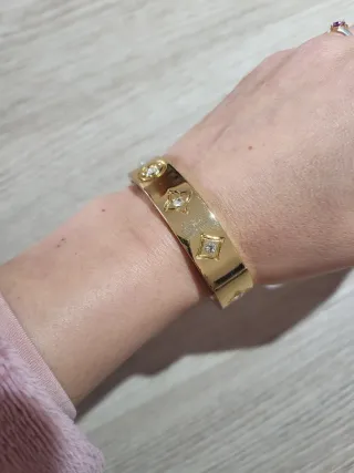 Pulsera rígida dorada cristales